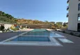 Kupić Nowy apartament 1+1 w Mahmutlar, Alanya - nowy budynek z widokiem na góry 3