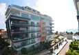 Buy Garden duplex 3+1 in Kargicak with furniture - property under citizenship 10 