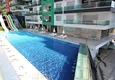 Buy Garden duplex 3+1 in Kargicak with furniture - property under citizenship 7 