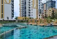 Kupić Apartament 1+1 przy plaży w Mahmutlar — umeblowany i z panoramicznym widokiem na morze 12 