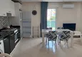 Dostępny zakup Apartament 1+1 w Tosmur z meblami krok od morza — nadaje się do uzyskania zezwolenia na pobyt 1 