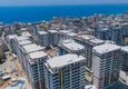 Купить Элитный двухэтажный пентхаус 4+1 с видом на море и крепость - центр Махмутлара 1