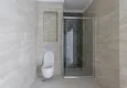 Доступная покупка Элитный двухэтажный пентхаус 4+1 с видом на море и крепость - центр Махмутлара 37