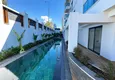 Buy 1+1 apartment with mountain views in Mahmutlar - resort-format complex 14