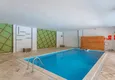 Buy Three bedroom apartment in Alanya, Mahmutlar district - furnished and with partial sea view 15 