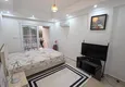 Affordable Purchase 2+1 apartment with furniture and access to the garden in the Avsallar area 17