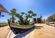 Buy 2+1 garden duplex in Turkler, Alanya - the format of a private house in a resort residence 42