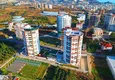 Купить Квартира 1+1 с мебелью, видом на море и горы в центре Махмутлара 1 