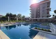 Buy 1+1 apartment overlooking the sea and the fortress on the beachfront in Kestel 18 