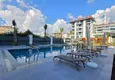 Buy 1+1 apartment overlooking the sea and the fortress on the beachfront in Kestel 19 