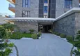 Buy 1+1 apartment overlooking the sea and the fortress on the beachfront in Kestel 27 