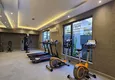 Buy 1+1 apartment overlooking the sea and the fortress on the beachfront in Kestel 34 