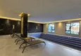 Buy 1+1 apartment overlooking the sea and the fortress on the beachfront in Kestel 37 
