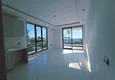 Affordable Purchase 1+1 apartment overlooking the sea and the fortress on the beachfront in Kestel 4 