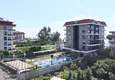 Buy 1+1 apartment overlooking the sea and the fortress on the beachfront in Kestel 8 
