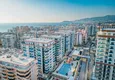 Buy 2+1 penthouse duplex with sea view in the center of Mahmutlar - installments of up to 12 months are possible 1