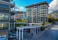 Buy 1+1 apartment in the center of Alanya - furnished and with sea views, installments are available 3