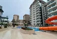 Buy 1+1 apartment 70 m² in the center of Mahmutlar — furnished, glazed balcony, installments up to 1 year 5
