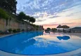 Buy 4+1 villa on the territory of a hotel complex in Mahmutlar — furniture, garden, panoramic view 10