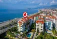 Buy 2+1 garden duplex in Kestel on the beachfront - with new furniture and sea views 1
