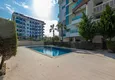 Buy 2+1 garden duplex in Kestel on the beachfront - with new furniture and sea views 11