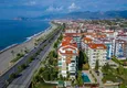 Buy 2+1 garden duplex in Kestel on the beachfront - with new furniture and sea views 2