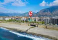 Buy 2+1 garden duplex in Kestel on the beachfront - with new furniture and sea views 4