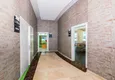 Buy Apartment 1+1 in the center of Mahmutlar - on the 12th floor with furniture and mountain views 17