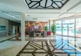 Buy Apartment 1+1 in the center of Mahmutlar - on the 12th floor with furniture and mountain views 9