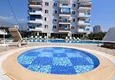 Buy 1+1 apartment in Mahmutlar — new furniture, 70 m², glazed balcony, sea and mountain views 10