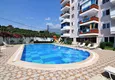 Buy 1+1 apartment in Mahmutlar — new furniture, 70 m², glazed balcony, sea and mountain views 2