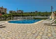 Buy 1+1 apartment in Mahmutlar — new furniture, 70 m², glazed balcony, sea and mountain views 8