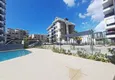 Buy 2+1 duplex in Mahmutlar with furniture and sea and mountain views 6