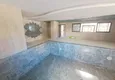 Buy 2+1 duplex in Mahmutlar with furniture and sea and mountain views 7