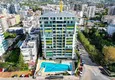 Buy 2+1 apartment in Mahmutlar — furniture, mountain view, first coastline 1