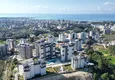 Купить Недвижимость в Алании с рассрочкой до 1 года - новая квартира 1+1 с видом на море в Авсалларе 1