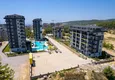 Купить Недвижимость в Алании с рассрочкой до 1 года - новая квартира 1+1 с видом на море в Авсалларе 5