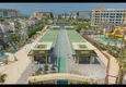 Купить Недвижимость в Алании - квартира 1+1 85 м2 с мебелью в премиальном resort-комплексе, район Тюрклер 31