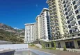 Buy Real estate in Alanya with sea view - 1+1 apartment in Mahmutlar 4