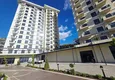 Kupić Nieruchomość w Alanyi z widokiem na morze - apartament 1+1 w Mahmutlar 8 