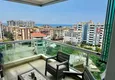 Buy 1+1 apartment in Tosmur, 76 m2 with furniture and sea view - property for a residence permit in Alanya 1