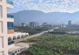 Affordable Purchase 3+1 apartment for a residence permit in Alanya, Mahmutlar district — single-level with furniture, panoramic views of the sea and mountains, from the owner 11
