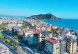 Buy 1+1 apartment in the center of Alanya — furniture, mountain view, 250 meters from Cleopatra beach 1