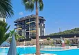 Kupić Apartament pod klucz z 1 sypialnią i przeszklonym balkonem w Alanya w dzielnicy Avsallar. Dostępna jest rata 8