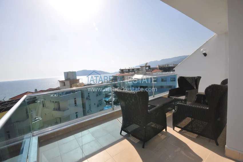 Dwupoziomowy penthouse w Tosmur jest przestronny z meblami i widokiem na morze 1 