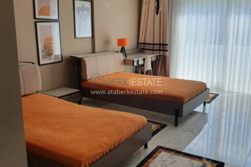 Kupuj Penthouse w Mahmutlarze z nowoczesnym wnętrzem w zadbanej rezydencji 12