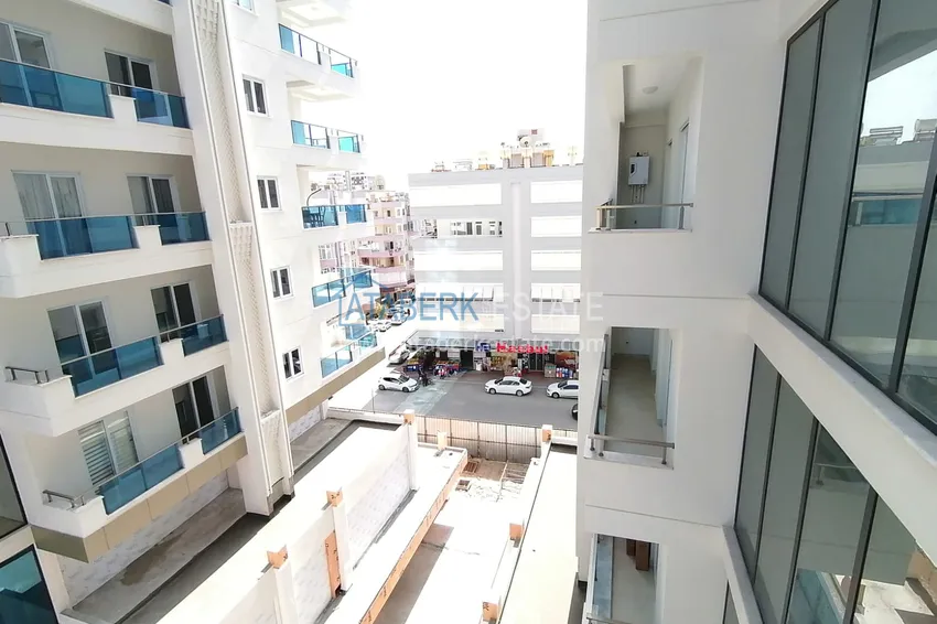 Kupuj Mieszkanie w Mahmutlarze z doskonałym wykończeniem w kompleksie z infrastrukturą hotelową 18