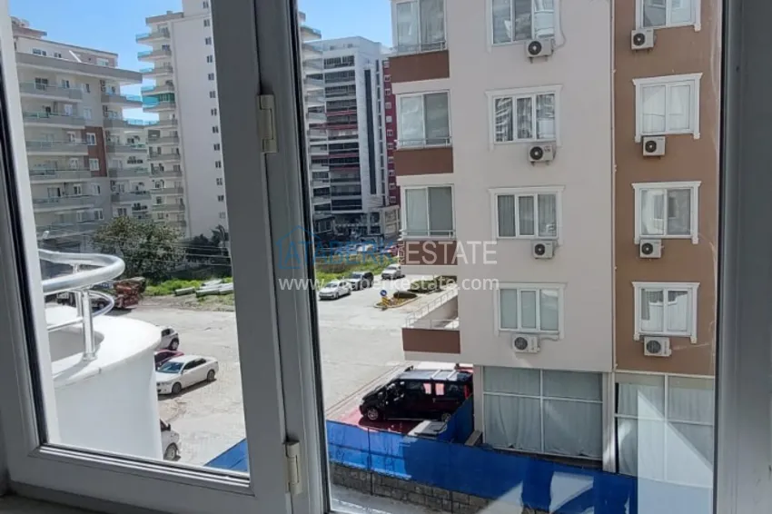Kupuj Trzypokojowe mieszkanie w Mahmutlarze z widokiem na góry - nieruchomość do odsprzedaży w Alanyi 4