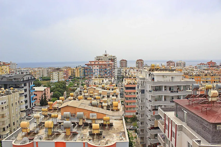 Kupuj Apartament w Mahmutlarze z autorskim remontem, przeszklonymi balkonami i widokiem na morze 25 