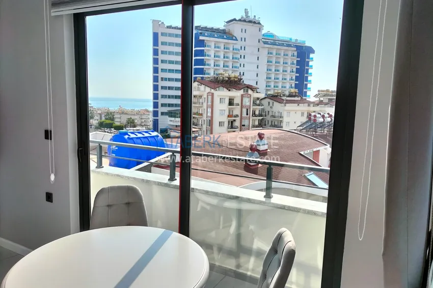 Purchase 1+1 penthouse with sea and mountain views in Alanya Tosmur B21 district 11